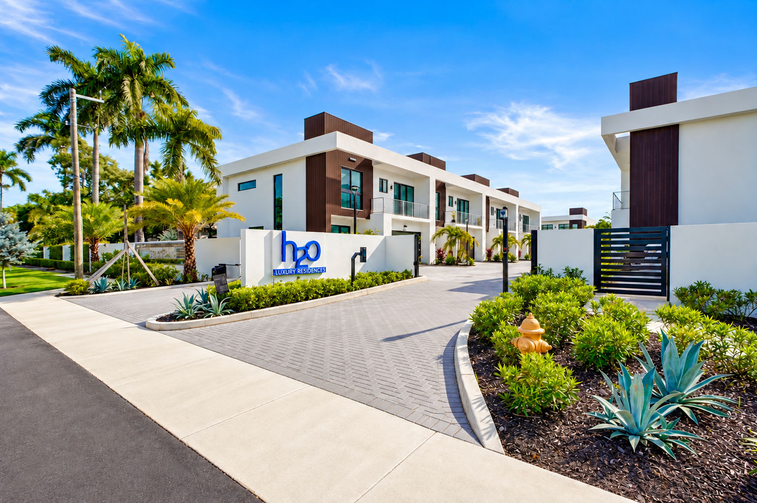 H20 Dania Beach gated entrance and completed townhomes